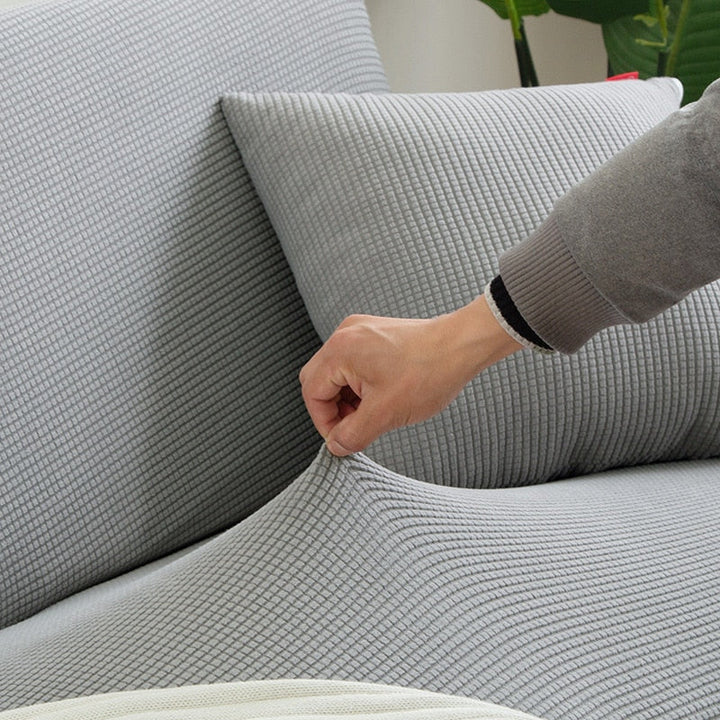 "StretchGuard rekbare bankhoes, elastisch, stijlvolle bescherming, antislip, perfecte pasvorm, modern interieurdesign"
