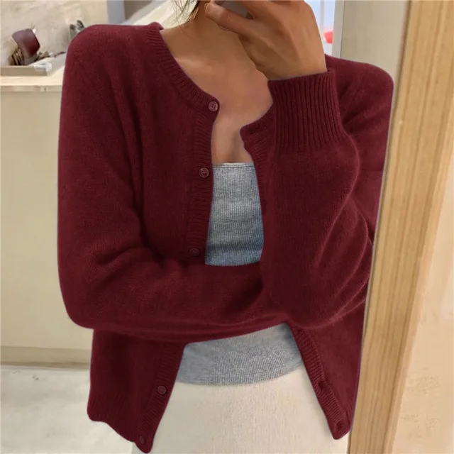 Warm en stijlvol damesvest met lange mouwen en knoopsluiting. De perfecte aanvulling op elke casual outfit.