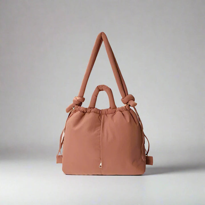 Elegante puffer handtas voor dames, ruim en praktisch met een chique uitstraling.