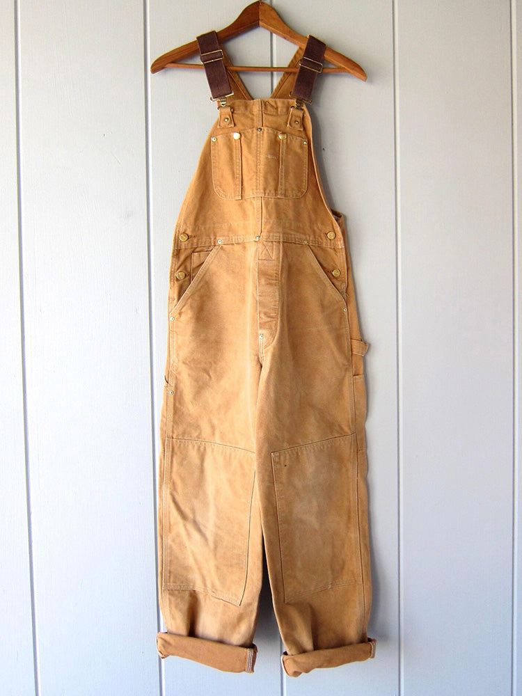 Comfortabele unisex canvas werkoverall van katoen, ideaal voor lange werkdagen, met verstelbare schouderbanden.