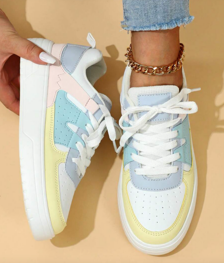 "Valeen sneakers voor dames, kleurrijk design met levendige pastelkleuren en ademend bovenwerk voor comfort en stijl."