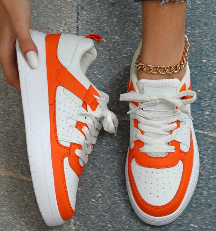 "Valeen sneakers voor dames, kleurrijk design met levendige pastelkleuren en ademend bovenwerk voor comfort en stijl."