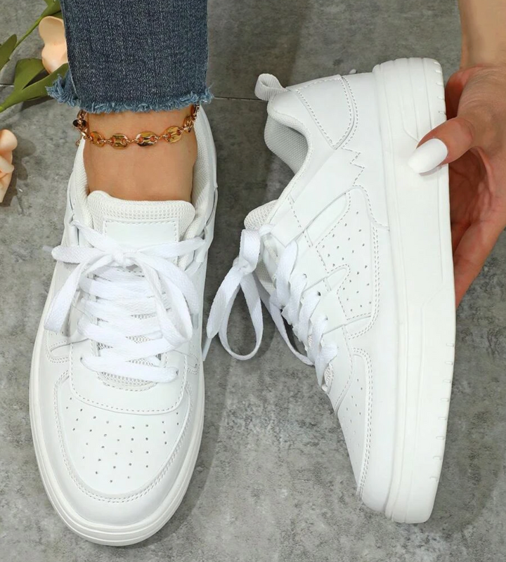 "Valeen sneakers voor dames, kleurrijk design met levendige pastelkleuren en ademend bovenwerk voor comfort en stijl."