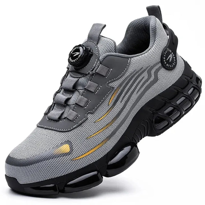 "Veiligheidssneakers met S3-classificatie, ademend donkergrijs mesh, zwarte rubberzool, ideaal voor dames op de werkvloer."