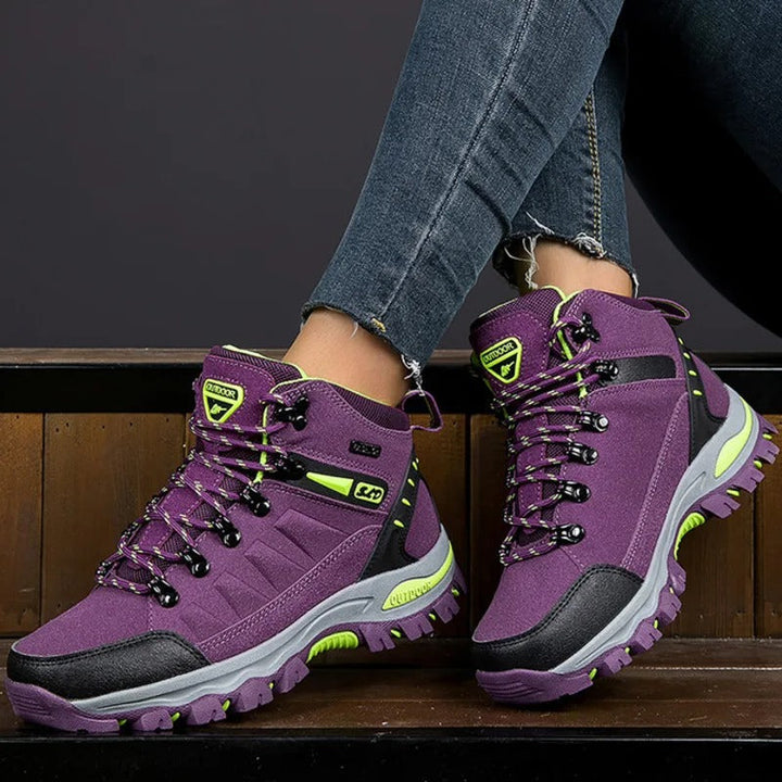 Veiligheidswerkschoenen voor dames, waterdicht en antislip, met versterkte enkelondersteuning en ronde teen, grijs.