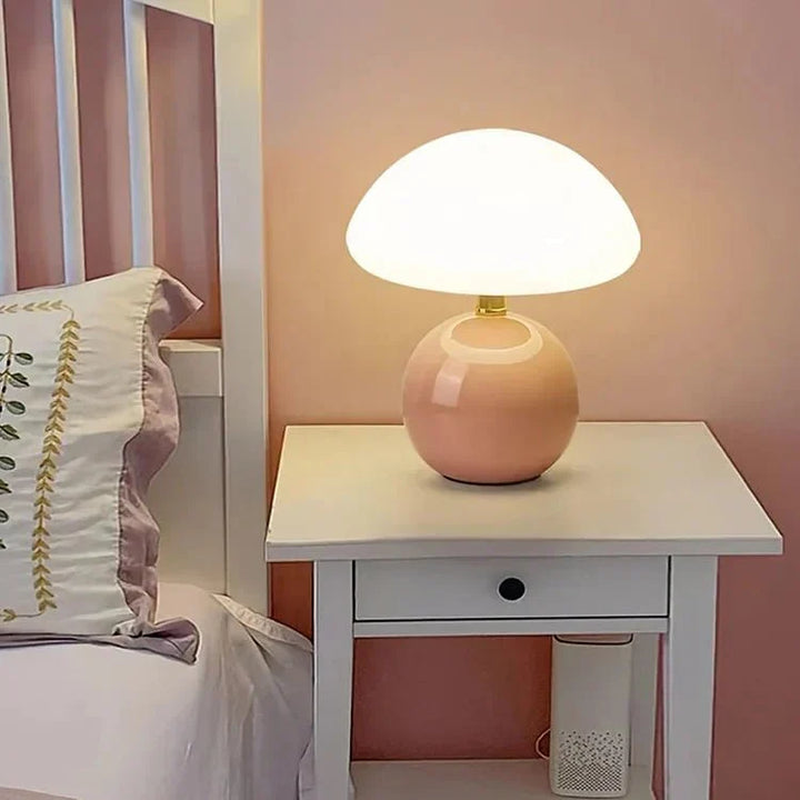 "Verstelbare LED paddenstoel lamp in modern design, keramiek en PVC, voor elegante sfeer in huis of kantoor."
