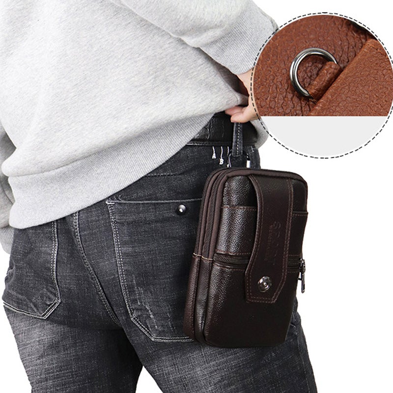 "Vintage leren heren crossbody heuptas met verstelbare band, stijlvolle bruine tas met ruime vakken en robuust ontwerp."