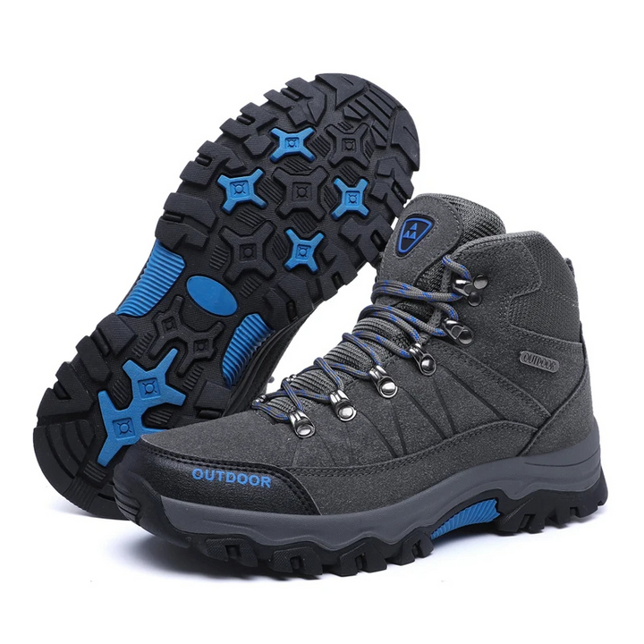 "Wandelschoenen heren, waterdicht en slipvast, robuust design in zwart-blauw; ideaal voor outdooractiviteiten."
