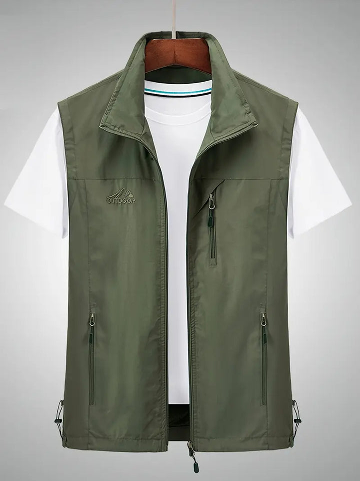 "Waterdicht heren vest, mouwloos, met rits. Ideaal voor regenachtige dagen. Blauw, groen, zwart opties. Comfortabel en stijlv