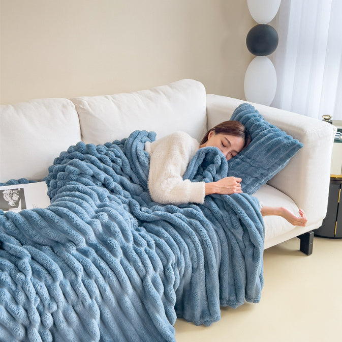 Ultra zachte en comfortabele fleece deken, perfect voor een knus gevoel en gezellige momenten thuis op de bank.