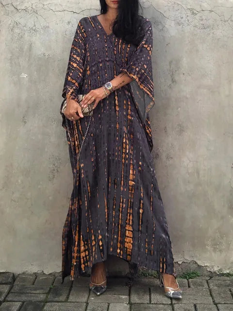 "Zomerse Janne kaftan maxi jurk voor dames, elegant design met exotische flair, ideaal voor zonnige dagen."