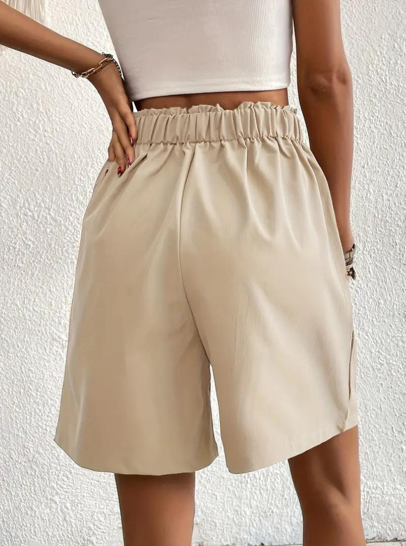 "Zomershort met plooien, hoge taille, zakken en luchtige pasvorm, ideaal voor elegante, comfortabele zomerse look."