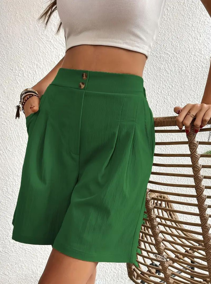 "Zomershort met plooien, hoge taille, zakken en luchtige pasvorm, ideaal voor elegante, comfortabele zomerse look."