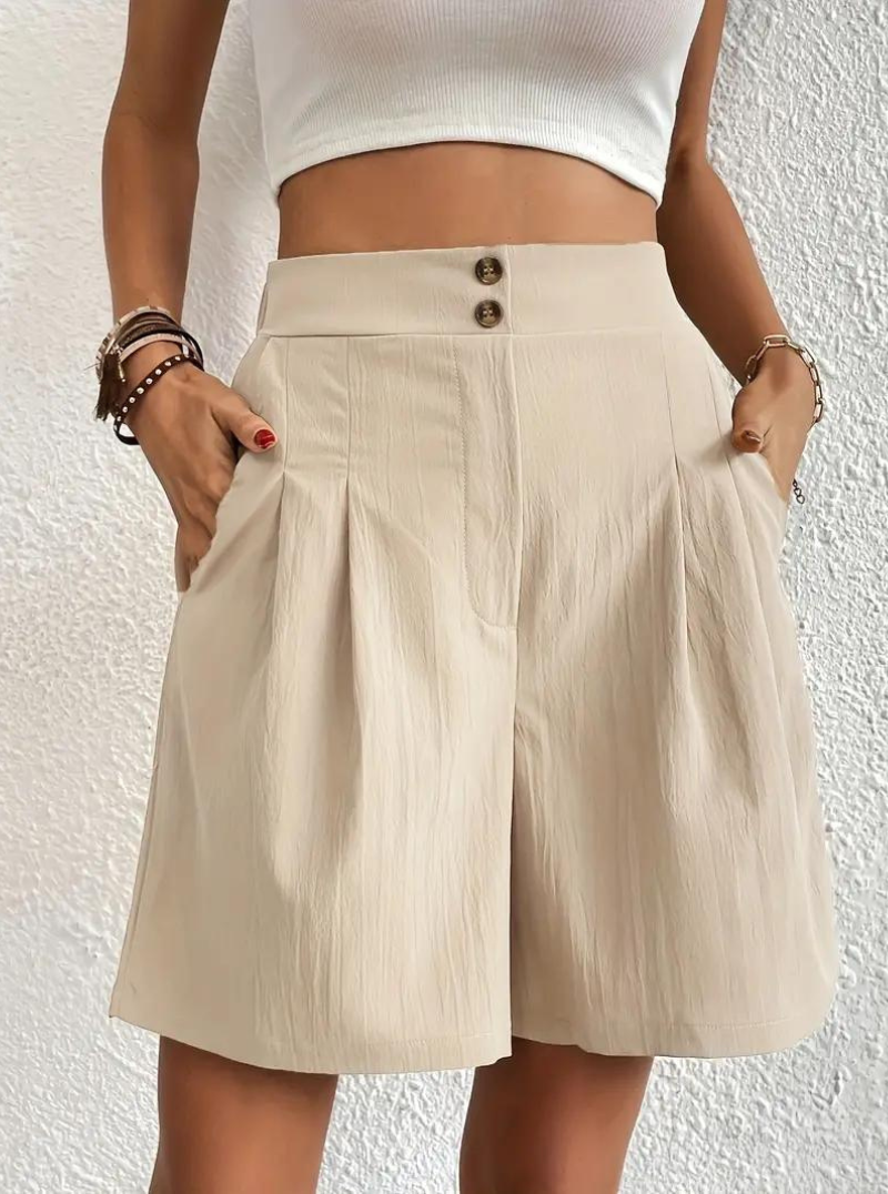 "Zomershort met plooien, hoge taille, zakken en luchtige pasvorm, ideaal voor elegante, comfortabele zomerse look."