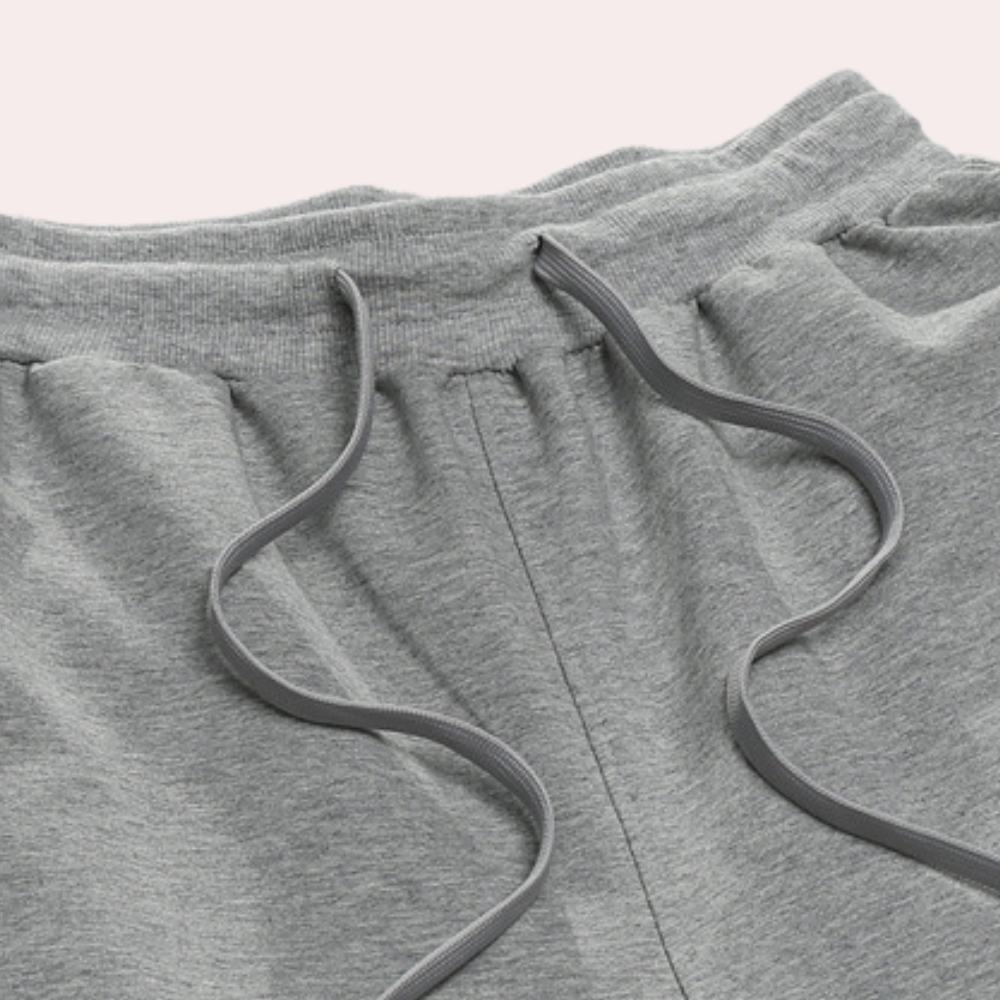 "Zwarte, donkerblauwe, donkergrijze en lichtgrijze joggingbroek voor heren, comfortabel met elastische taille en trekkoord"