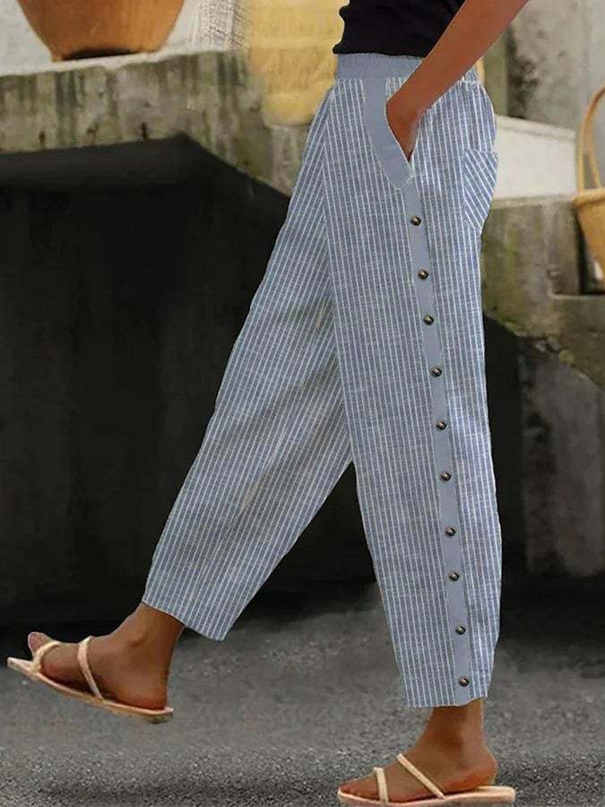 "Zwarte hemelzachte comfortbroek voor dames met elastische tailleband, elegant design en praktische zakken, perfect voor loun