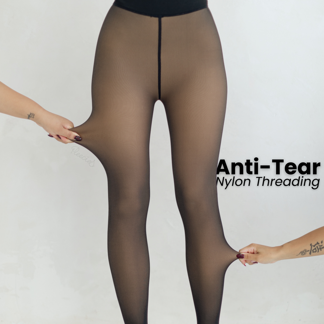 "Zwarte slimfit fleece panty met transparante look en vormend effect voor stijl en warmte in de koude maanden."